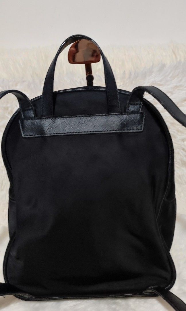 🇯🇵Kate Spade🇯🇵🎒backpack (Category: Luxury Bags & Wallets) located in Cavite. Submitted by yerbua103 (Listing ID 1317863732, Image 3). Description: 👉This Kate Spade New York Chelsea backpack is a stylish and functional accessory crafted in black leather and nylon materials. The backpack has a zip-around closure and adjustable straps. Interior is lined with nylon and features a side-zipped and slip-on pockets for ample storage space. It is pe