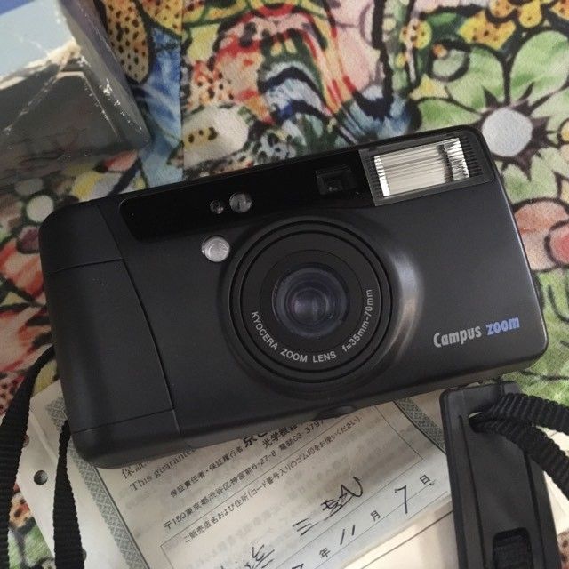 Kyocera campus zoom with Box and leaflets (Category: Cameras) located in Las Pinas. Submitted by film101 (Listing ID 1317806894, Image 2). Description: Kyocera campus zoom film camera With box, leaflets, straps, feels like new or mint condition Pwede pang gift since the cosmetics still presentable No issues ELECTRONIC COND. Flash working Meter working Shutter working Aperture snaps Auto advance working Rewind working Run by Cr123A 1 pc not incl.