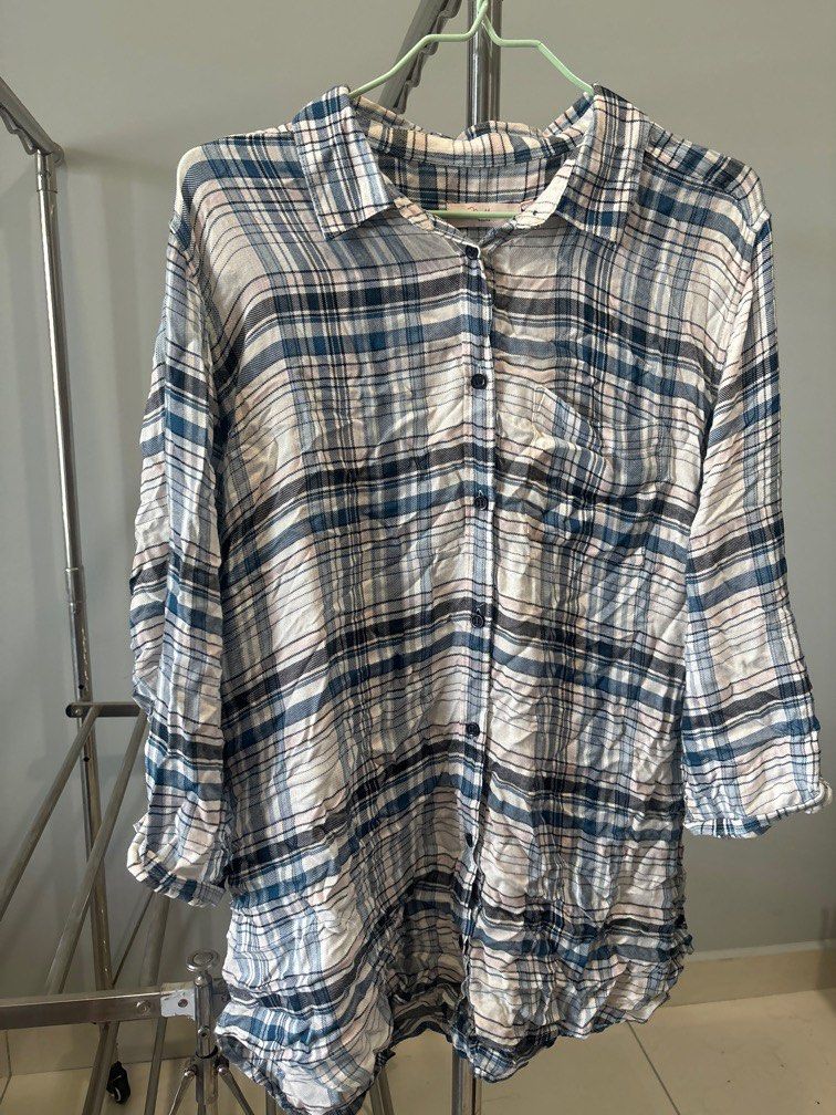 Miller checked shirt (Category: Blouses) located in Subang Jaya. Submitted by thebigheadprawn (Listing ID 1317748668, Image 1). Description: White blue checked Front 1 pocket Free size fits xxl-xxxl.