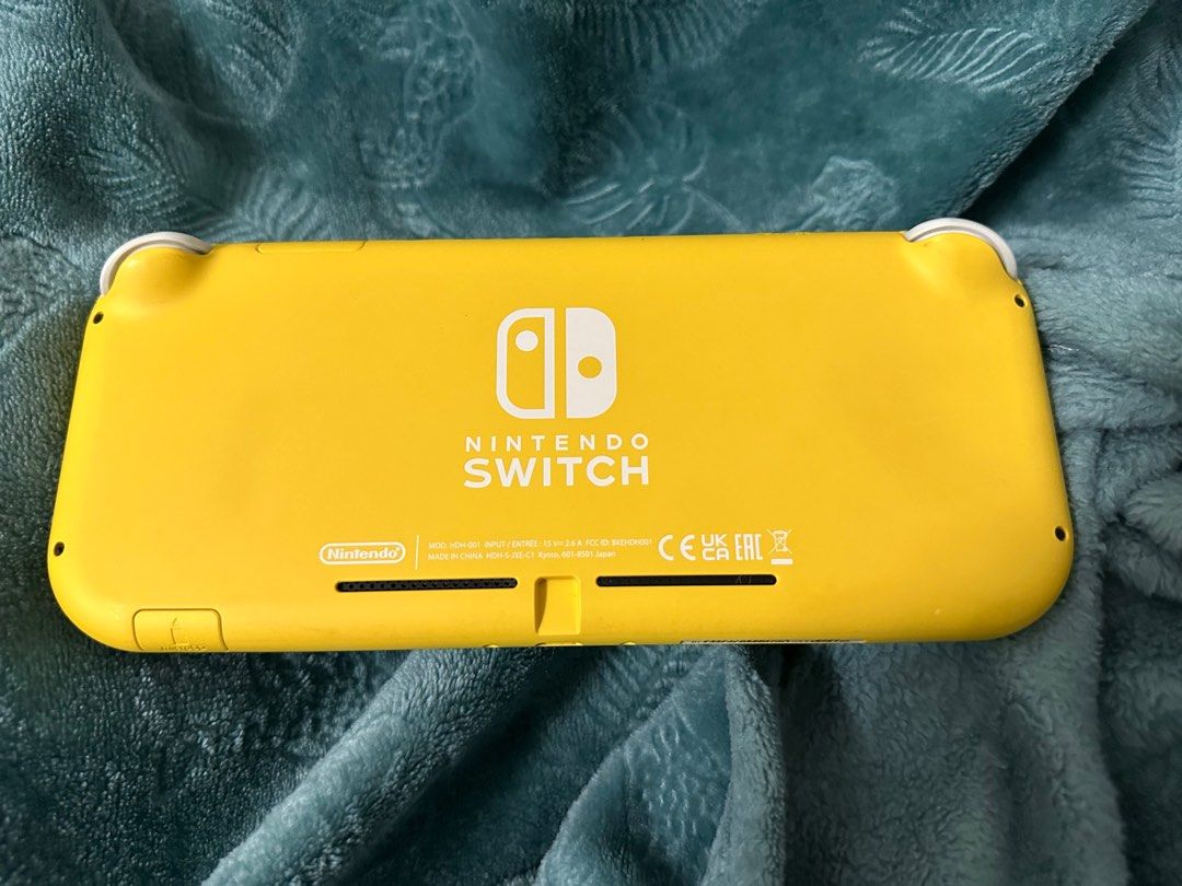 Nintendo Switch Lite (yellow) (Category: Nintendo) located in Binan City. Submitted by badooo (Listing ID 1317876759, Image 2). Description: Negotiable! Lady-owned Nintendo game: Pokemon and GTA Trilogy No issue You can test all you want With free carrying Pouch (black) .