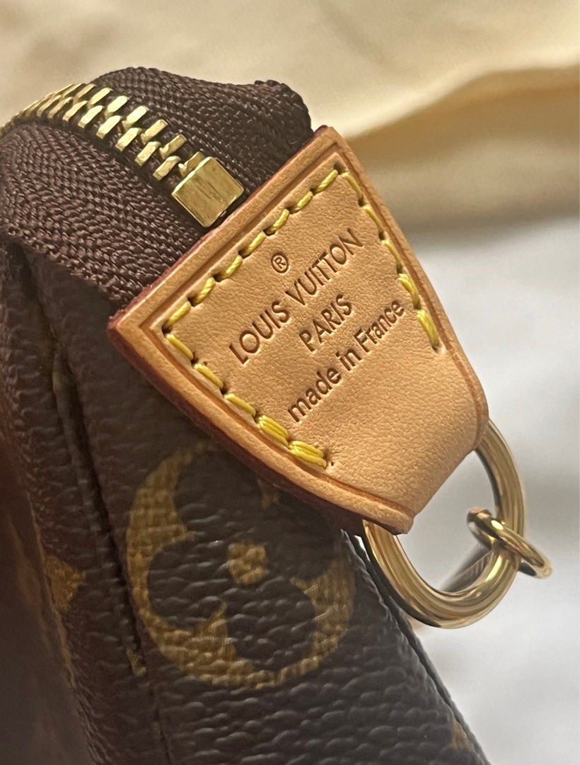 Original Louis Vuitton Mini Pochette with Box (Category: Luxury Bags & Wallets) located in Quezon City. Submitted by sherockxx (Listing ID 1317877379, Image 2). Description: Guaranteed authentic. Flawless condition. Super nice in actual. Complete inclusions..