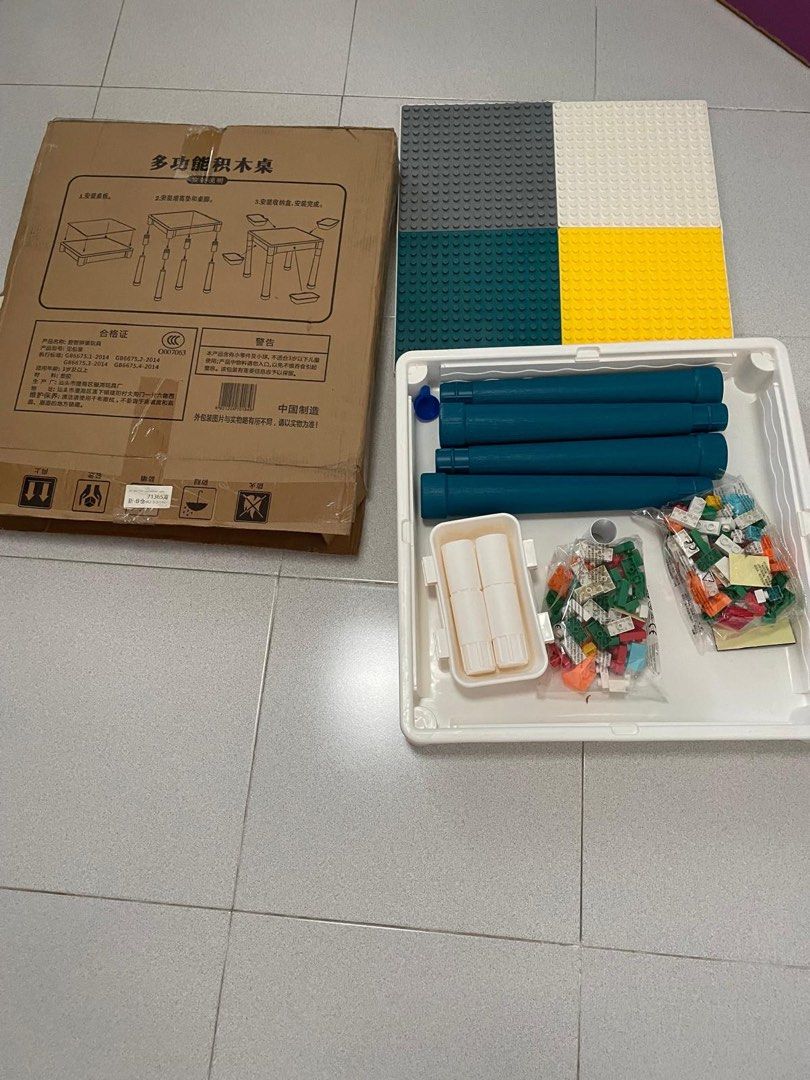 Study & playing table (Category: Kids' Tables & Chairs) located in Singapore. Submitted by corrine.ctl (Listing ID 1317770831, Image 2). Description: Brand new with box Table length 50cm .
