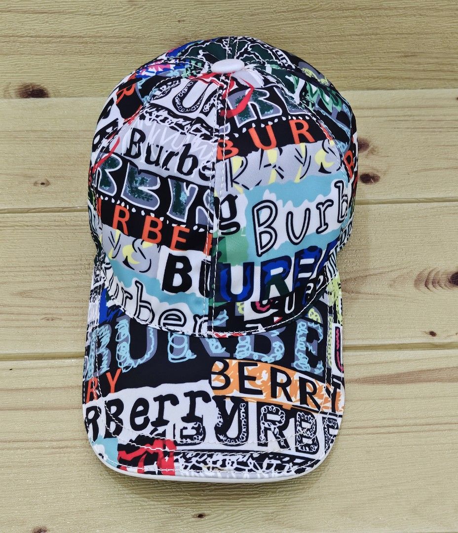 B rberrY Graffiti Cap Women s Fashion Watches Accessories Hats Beanies on Carousell