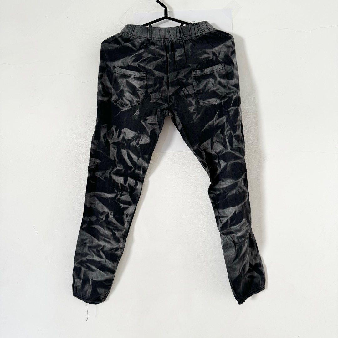 Black ripped sweatpants top