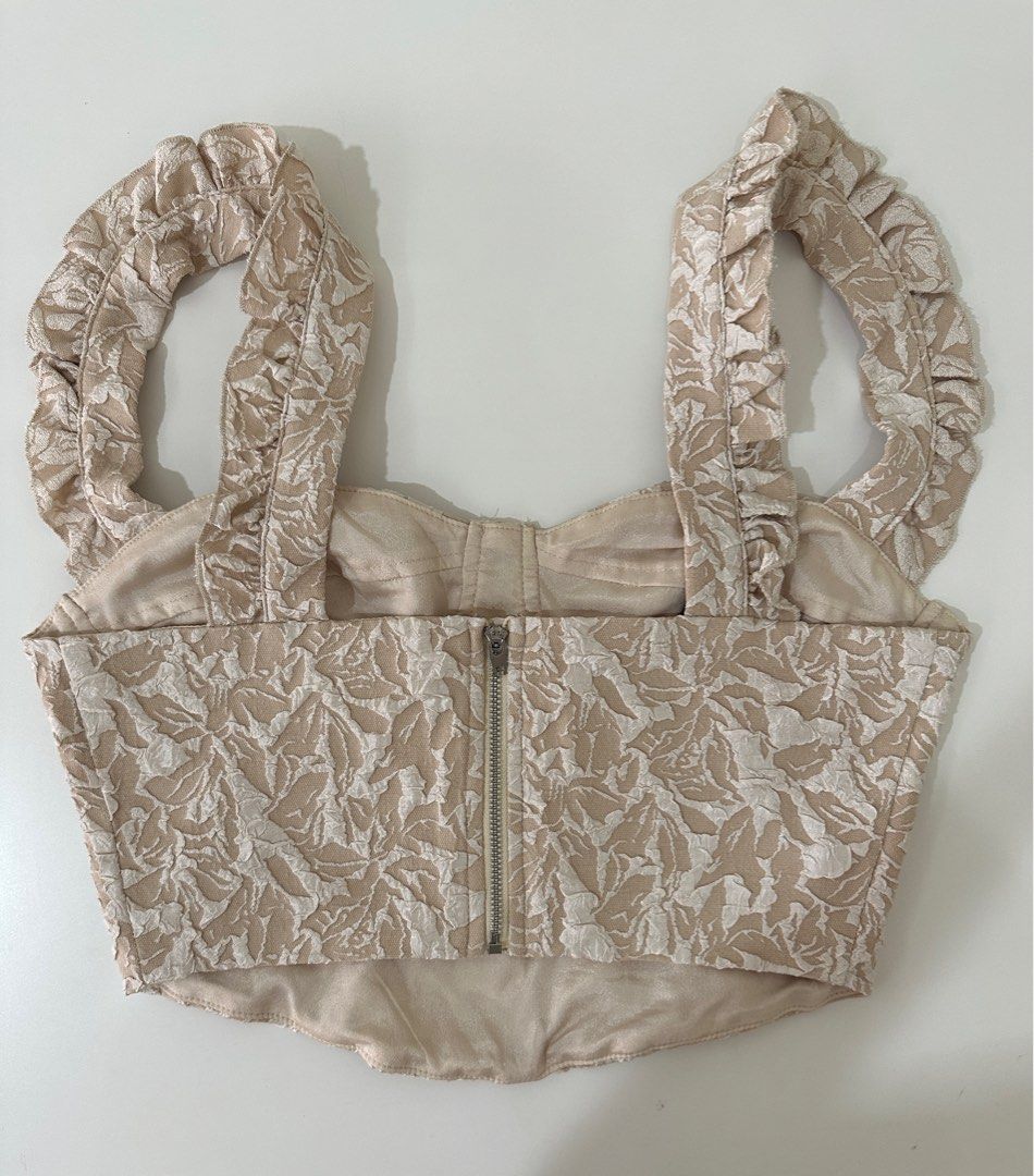 Lace Corset Crop Top with Ruffle Strap (Category: Shirts) located in Muntinlupa City. Submitted by jtarchive (Listing ID 1321008943, Image 3). Description: super pretty and elegant lace ruffle corset crop top RFS: i don’t get to wear it and it’s just been laying in my closet :( for reference i’m 34 B 26 W .