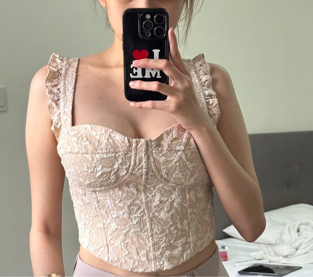 Lace Corset Crop Top with Ruffle Strap (Category: Shirts) located in Muntinlupa City. Submitted by jtarchive (Listing ID 1321008943, Image 2). Description: super pretty and elegant lace ruffle corset crop top RFS: i don’t get to wear it and it’s just been laying in my closet :( for reference i’m 34 B 26 W .