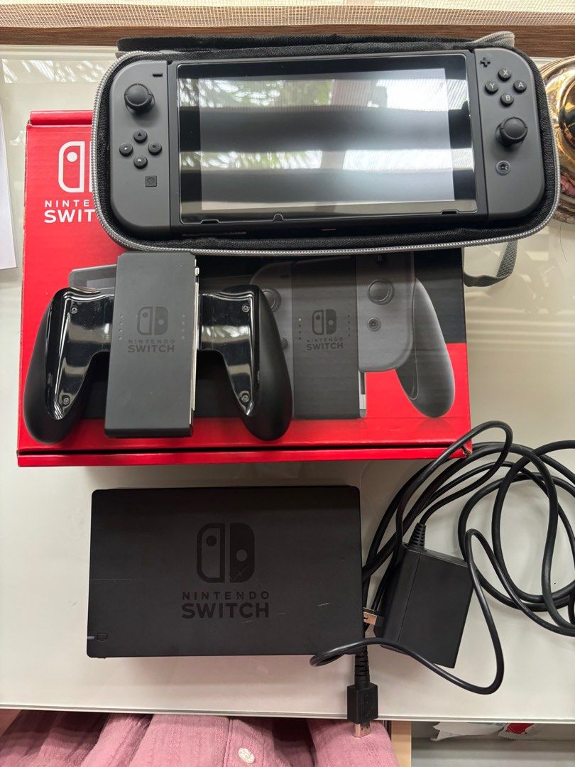 LIKE NEW NINTENDO SWITCH WITH GAMES (Category: Nintendo) located in Las Pinas. Submitted by monicasellsstuff (Listing ID 1321010285, Image 3). Description: Complete inclusions BOX, RECEIPT, JOY CON STRAPS, HDMI, SWITCH DOCK, JCON GRIP, AC ADAPTER Freebie: NINTENDO CASE With SUPER MARIO & 2K23 GAME (Super Mario with case di ko lang na picture-an) .