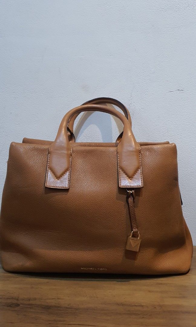 MK Rollins coklat