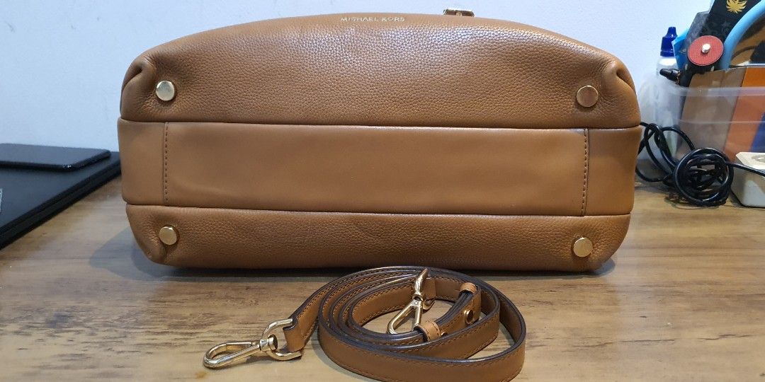 MK Rollins coklat