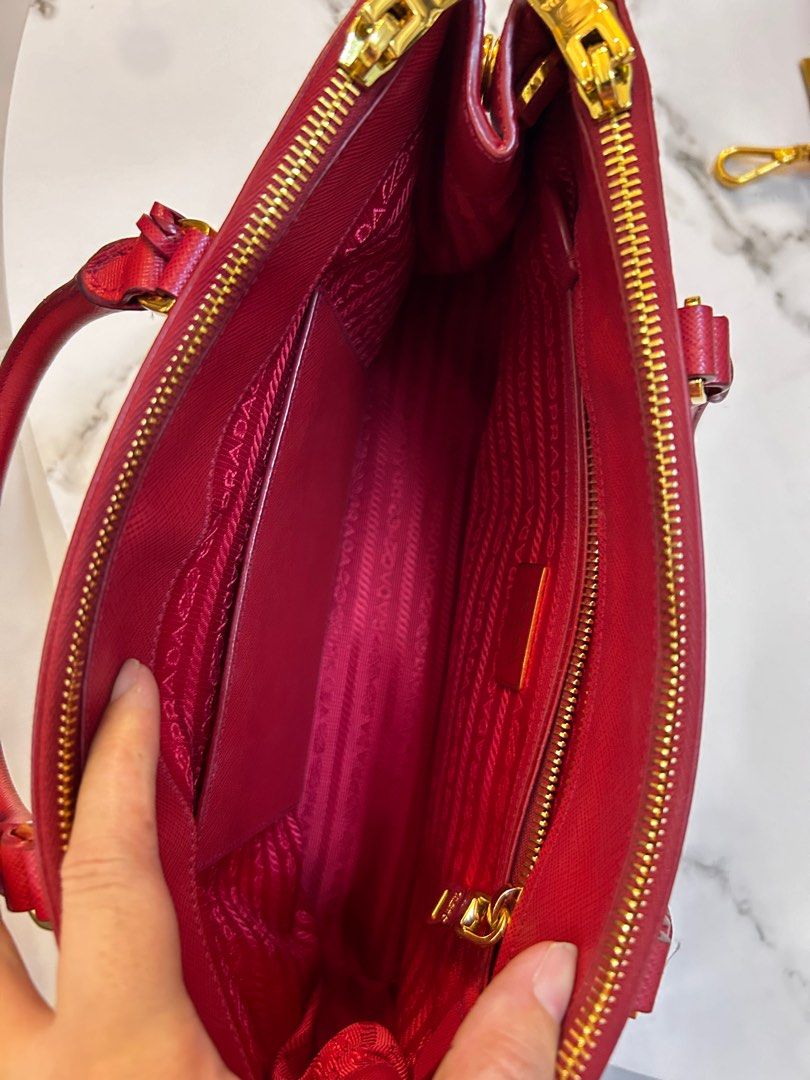 Prada 2 way Bag (Category: Luxury Bags & Wallets) located in Quezon City. Submitted by joanneluy (Listing ID 1320960905, Image 3). Description: 😀From Japan🇯🇵my second hone🏡 ✅ Original, Authentic, bags only‼️ ✅provided dust bag only ✅ material leather safiano ✅double zipper bag with sling ✅ prada italy complete with white tag and original markings inside. ✅mop: gcash or bank transfer ✅available and ready to ship ✅shipping charge to buyer.