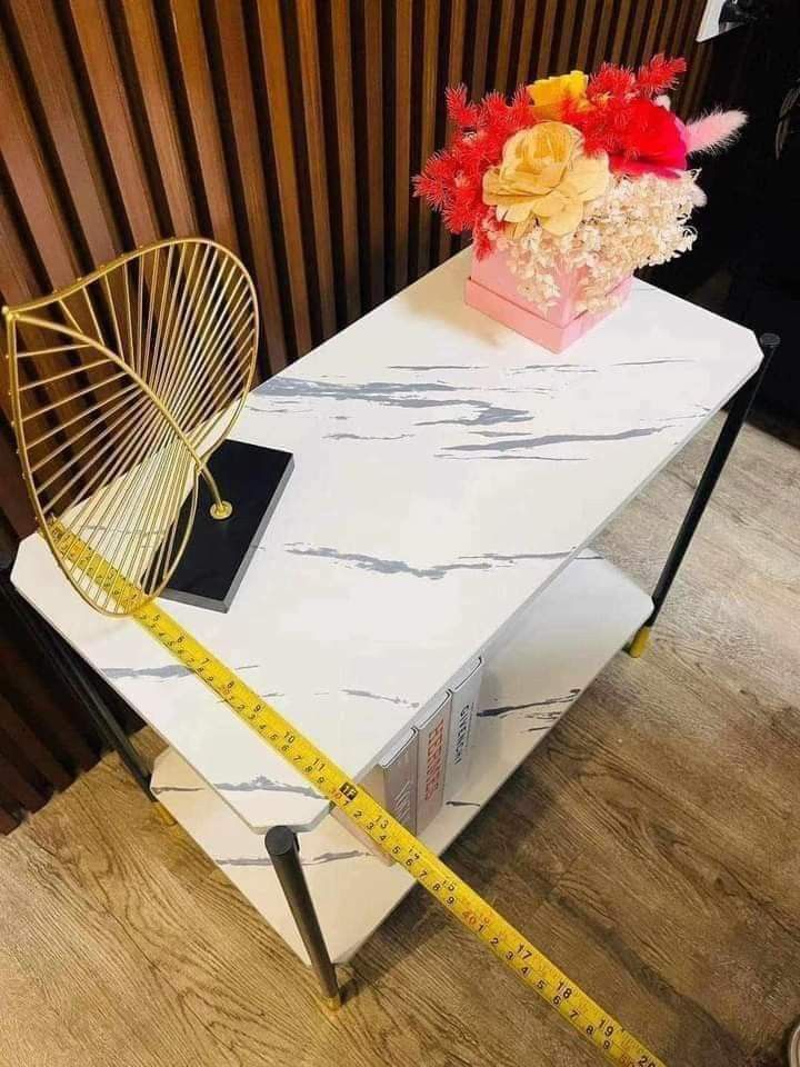 Side Table (Category: Tables & Sets) located in Manila. Submitted by redonlineshop (Listing ID 1320984166, Image 3). Description: Side Table 02 60x30x55cm black marble white marble ₱700 ON HAND BRAND NEW Mode of Payment: Gcash,COD Same day delivery + Delivery Fee.