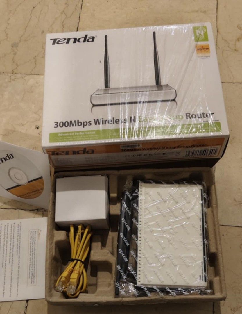 Tenda 300mbps wifi router (Category: Networking) located in Makati City. Submitted by thrifthub.ph (Listing ID 1320953840, Image 3). Description: unused.