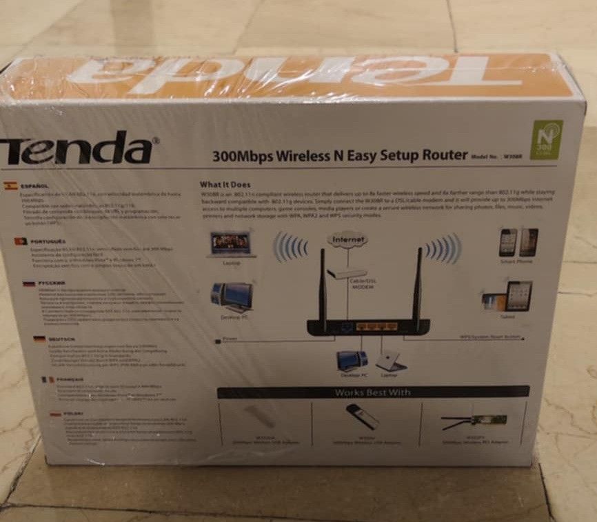 Tenda 300mbps wifi router (Category: Networking) located in Makati City. Submitted by thrifthub.ph (Listing ID 1320953840, Image 2). Description: unused.