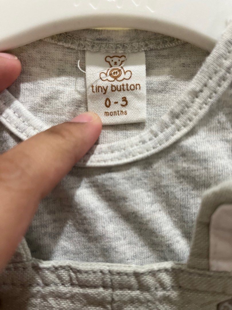 Tiny Button Dungaree with Tee (Category: Babies & Kids Fashion) located in Seremban. Submitted by ainonpreloved (Listing ID 1320972691, Image 2). Description: - Used once only - A set of dungaree with tshirt inside from Tiny Button - Size 0-3 months - I washed with baby laundry detergent only. - Normal price RM89. Selling it for RM50 bcs the set still look new & in tip top condition..