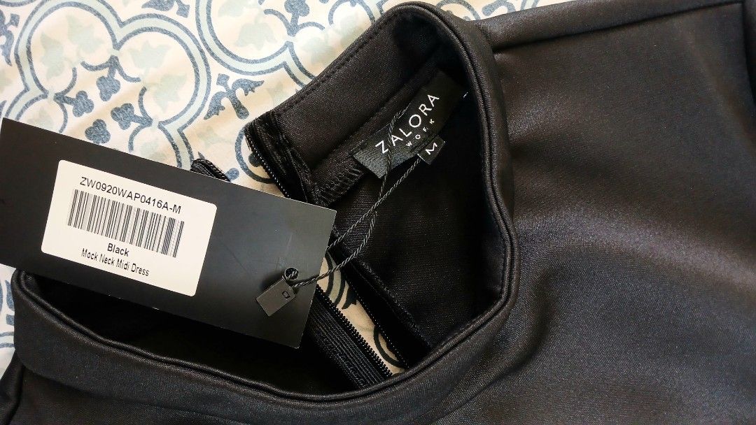 Zalora Work Mock Neck Midi dress (Category: Dresses) located in Quezon City. Submitted by iceegems (Listing ID 1320984631, Image 3). Description: - bought for P695 sa Zalora app - medium size - impulse buy, never used, stored only. With tag pa as shown sa photos - can be worn for corporate office, semi formal events, meetings, etc. - thick fabric - no flaws - it looks very classy when worn, lalo na when paired with heels. MOP: gcash or bank trans