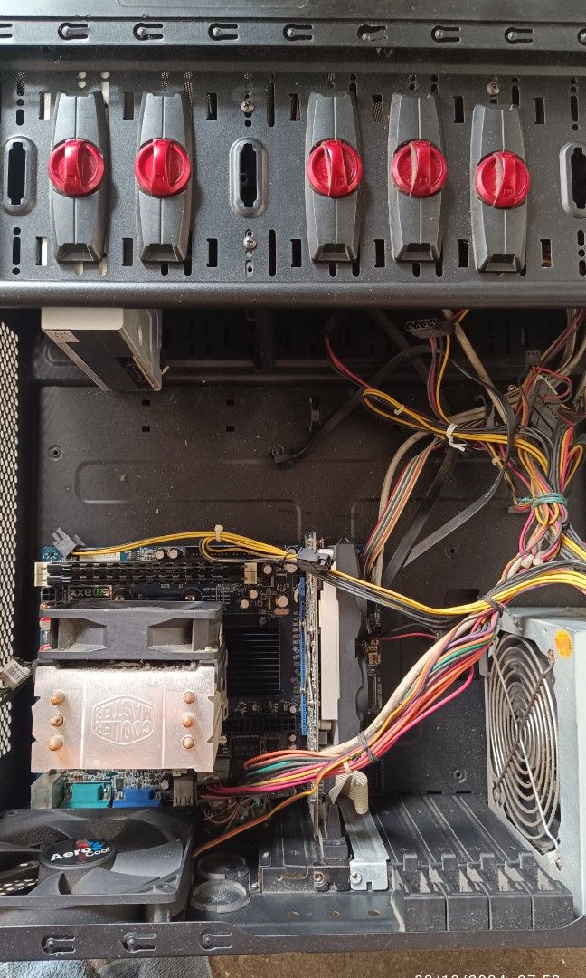 Defective CPU (Category: Desktops) located in Pasig City. Submitted by richard.dg (Listing ID 1321194679, Image 3). Description: AMD Phenom II Processor Emaxx Motherboard 2x - Graphic Cards - HD5670 1GB DDR 5 - HD5450 1GB DDR 3 2 x 4GB G.Skill DDR3 Memory Cooler Master Heat Sink/Fan Aero Cool Casing CDROM Drive Power Supply No hard disk included As is, where is.
