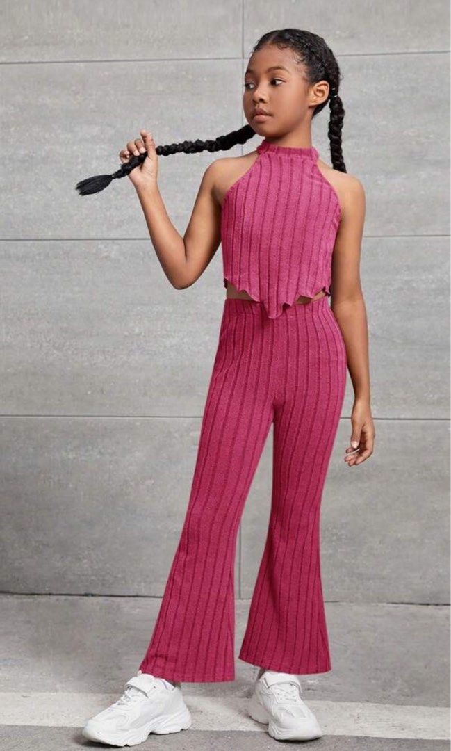 Lettuce Trim Halter Top & Flare Leg Pants (Category: Babies & Kids Fashion) located in Dasmarinas. Submitted by prelovedbyZ (Listing ID 1320835729, Image 1). Description: Brand: Shein Size: 10Y (134-140cm) Color: Hot Pink Condition: Like new, used once. Pants Lenght: 82cm Waist: 55-82cm Hip size: 73cm Thigh: 43.6cm Top Lenght: 42cm Bust: 71cm Note: This data was obtained from manually measuring the item, it may be off by 1-2cm..