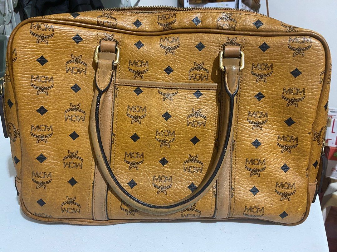 MCM Laptop bag (Category: Luxury Bags & Wallets) located in Escalante. Submitted by relicofthenorth.082630 (Listing ID 1321254578, Image 2). Description: MCM Document/Laptop bag Excellent condition 10.5 length 15 width Sign of used.