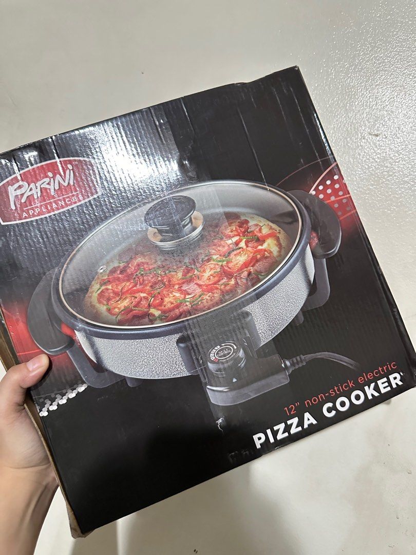 Parini 12” Non Stick Electric Plugin Pizza Cooker (Category: Cookers) located in Davao. Submitted by jmcare (Listing ID 1321261252, Image 1). Description: Pizza Cooker.