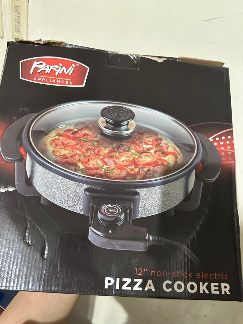 Parini 12” Non Stick Electric Plugin Pizza Cooker (Category: Cookers) located in Davao. Submitted by jmcare (Listing ID 1321261252, Image 2). Description: Pizza Cooker.