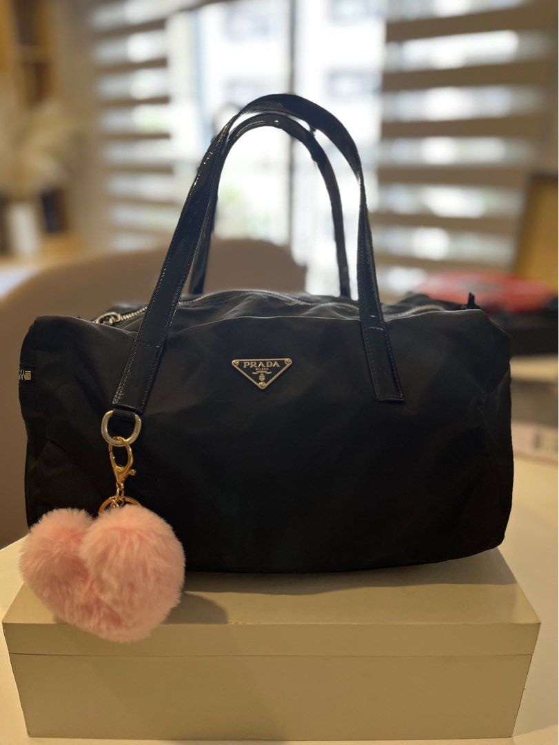 Prada Tessuto vintage nylon bag (Category: Luxury Bags & Wallets) located in Pasig City. Submitted by prencyssa (Listing ID 1321140551, Image 1). Description: Bought in Japan last year for 15,000 php Guaranteed authentic Color black, nylon material Best if you have a bag shaper Can fit a lot of stuff inside Can be an office bag/gym bag No flaws just sign of usage Reason for selling: I don't use it anymore.