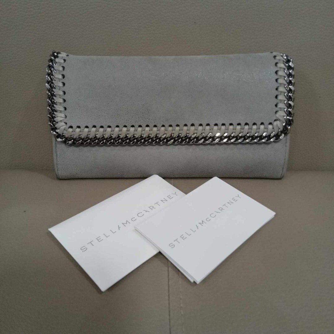 Stella McCartney Long Wallet (Category: Luxury Bags & Wallets) located in Taguig. Submitted by esa.agustin (Listing ID 1321176085, Image 2). Description: Original Stella McCartney gray soft leather long wallet. With box and authenticity card. Made in Italy..