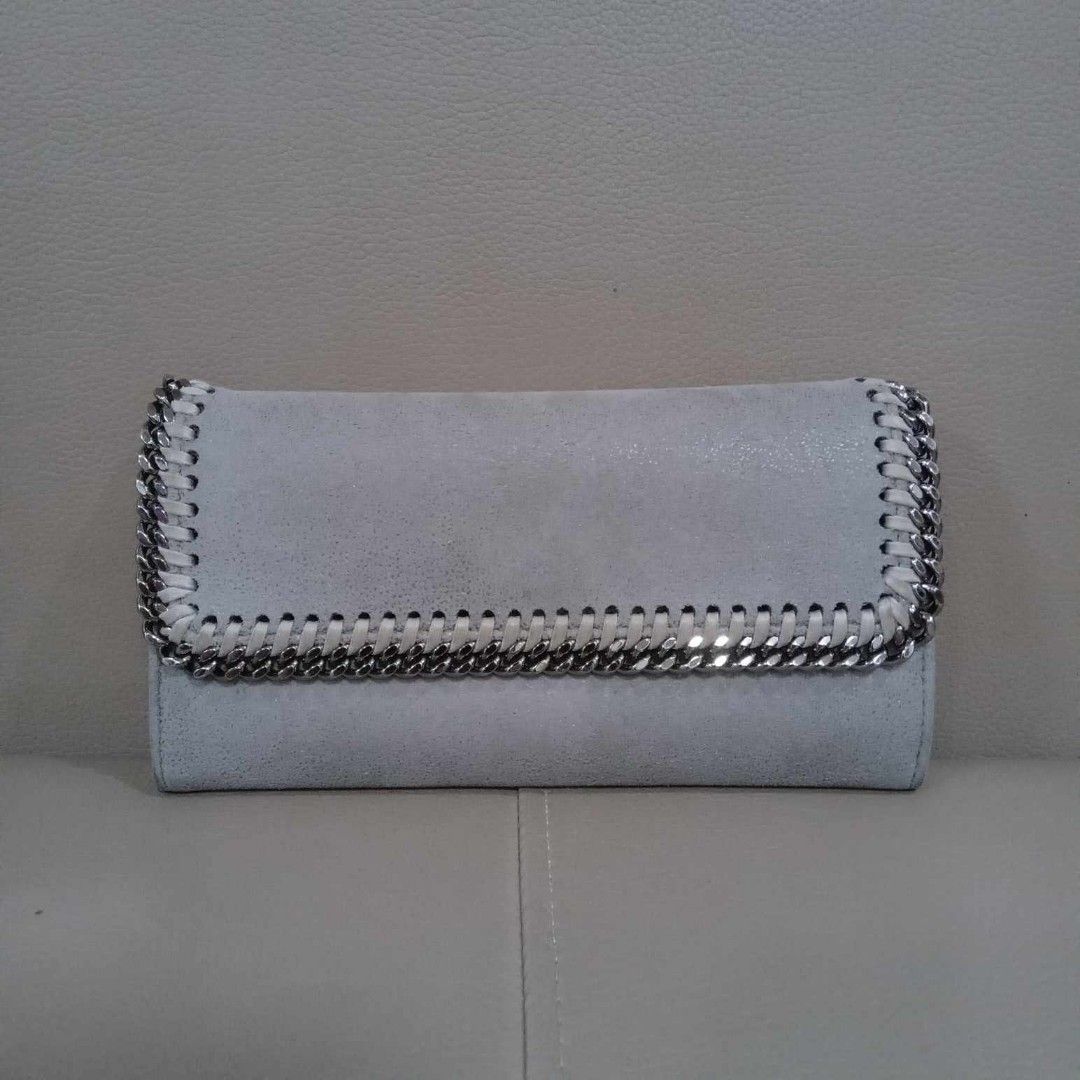 Stella McCartney Long Wallet (Category: Luxury Bags & Wallets) located in Taguig. Submitted by esa.agustin (Listing ID 1321176085, Image 1). Description: Original Stella McCartney gray soft leather long wallet. With box and authenticity card. Made in Italy..