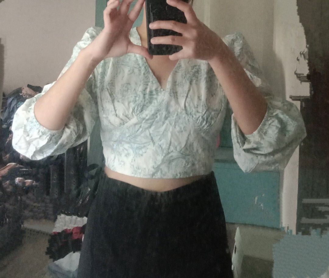 White and Blue Top (Category: Blouses) located in Porac. Submitted by declutterwithargel (Listing ID 1321142128, Image 2). Description: Fits small to medium Tinanggal ko lang yung tag then nilabhan pero never used Not super white yung color, more on milky white cream-ish Open po yung back Super pretty ng top Perfect for beach trips!.