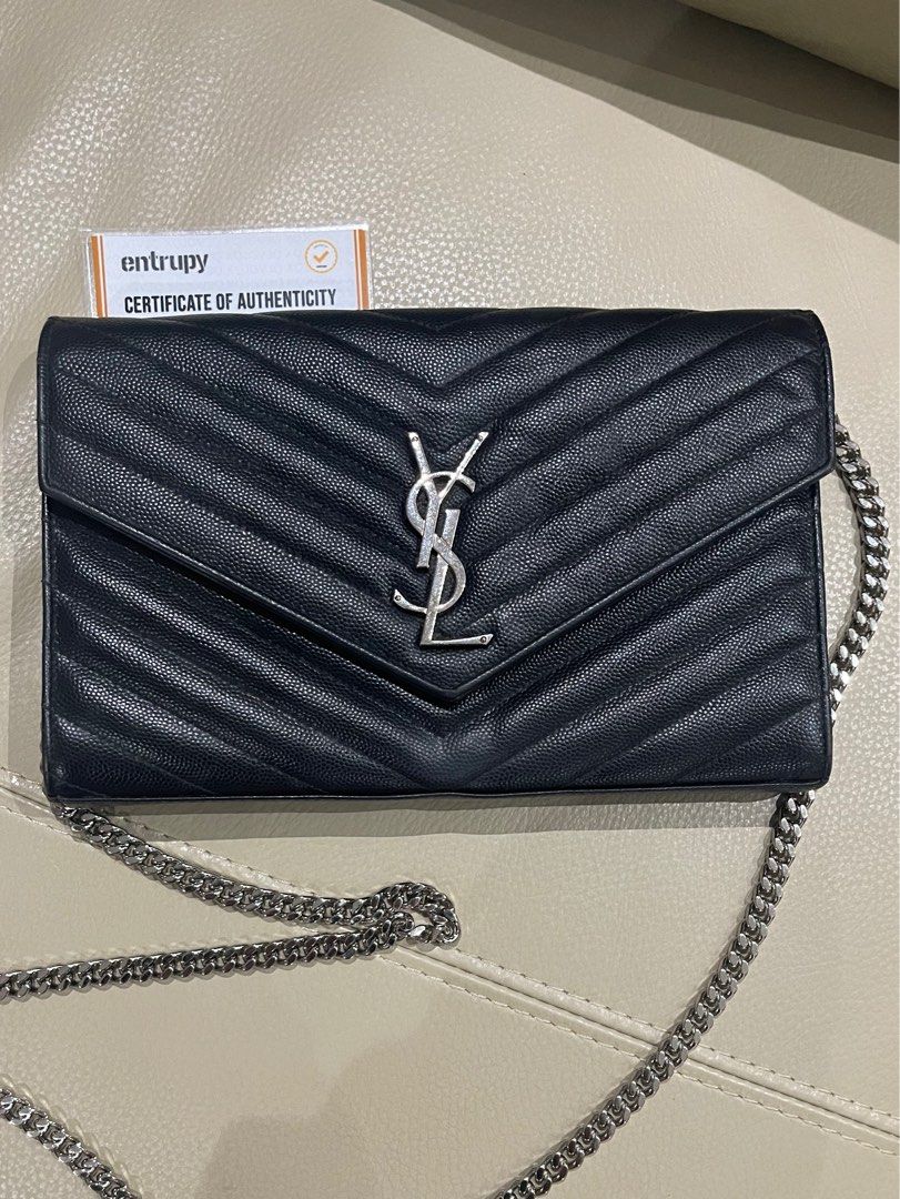 Price drop! YSL Saint Laurent WOC medium w/ Entrupy (Category: Cross-body Bags) located in Rizal. Submitted by mj_arce (Listing ID 1321245335, Image 1). Description: Hardware and chain are still very shiny and smooth With ENTRUPY Cert/Guaranteed authentic Comes with generic dustbag only minor rubs on corners and small discoloration below logo. Shipping from Taytay, Rizal.