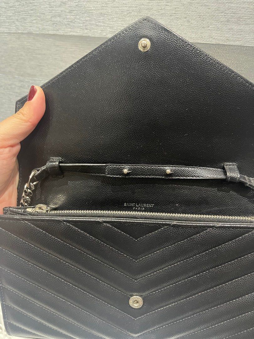 Price drop! YSL Saint Laurent WOC medium w/ Entrupy (Category: Cross-body Bags) located in Rizal. Submitted by mj_arce (Listing ID 1321245335, Image 3). Description: Hardware and chain are still very shiny and smooth With ENTRUPY Cert/Guaranteed authentic Comes with generic dustbag only minor rubs on corners and small discoloration below logo. Shipping from Taytay, Rizal.
