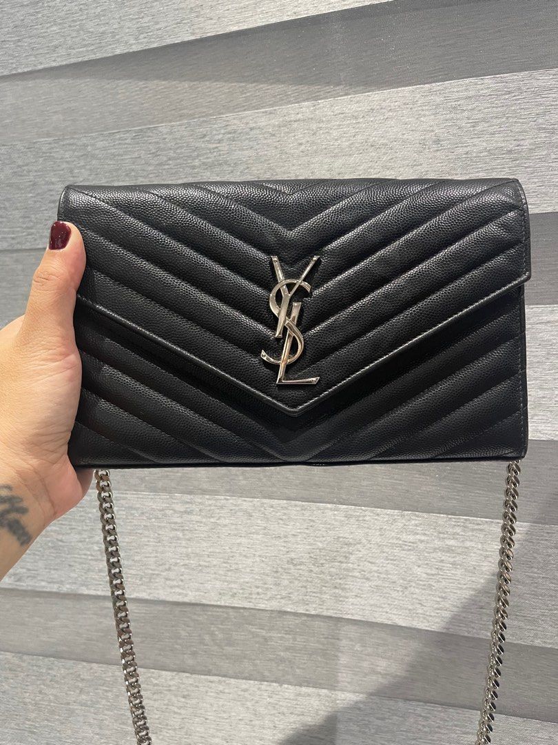 Price drop! YSL Saint Laurent WOC medium w/ Entrupy (Category: Cross-body Bags) located in Rizal. Submitted by mj_arce (Listing ID 1321245335, Image 2). Description: Hardware and chain are still very shiny and smooth With ENTRUPY Cert/Guaranteed authentic Comes with generic dustbag only minor rubs on corners and small discoloration below logo. Shipping from Taytay, Rizal.