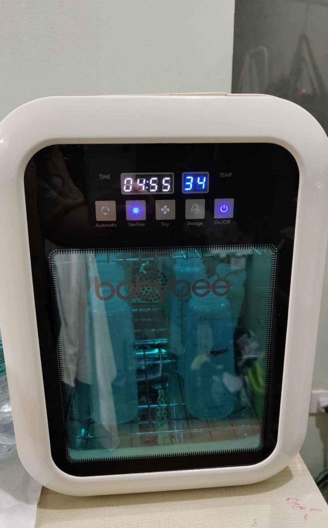Babybee Sterilizer (Category: Other Baby Bathing & Changing Needs) located in Las Pinas. Submitted by declutterqueeeeen (Listing ID 1321367945, Image 1). Description: Working UV light with minimal rust lose thread power cord.