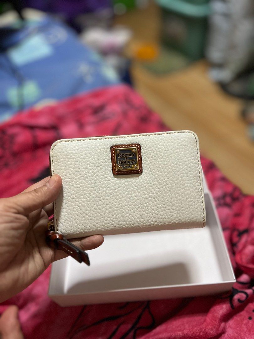BNWT Dooney wallet (Category: Luxury Bags & Wallets) located in Quezon City. Submitted by cprmob (Listing ID 1312837061, Image 2). Description: BNWT Pebble grain Medium sized zip around wallet From US.