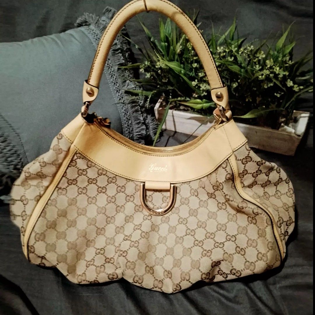 Gucci gold hobo bag hotsell