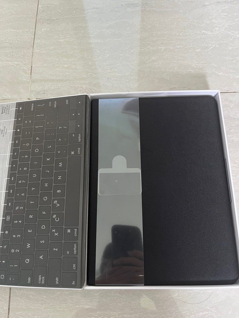 Logitech Slim Folio (Category: Cases & Sleeves) located in Singapore. Submitted by royaltree.6bedda (Listing ID 1321383721, Image 3). Description: Selling a brand new Logitech slim folio For ipad 5th gen and 6th gen .
