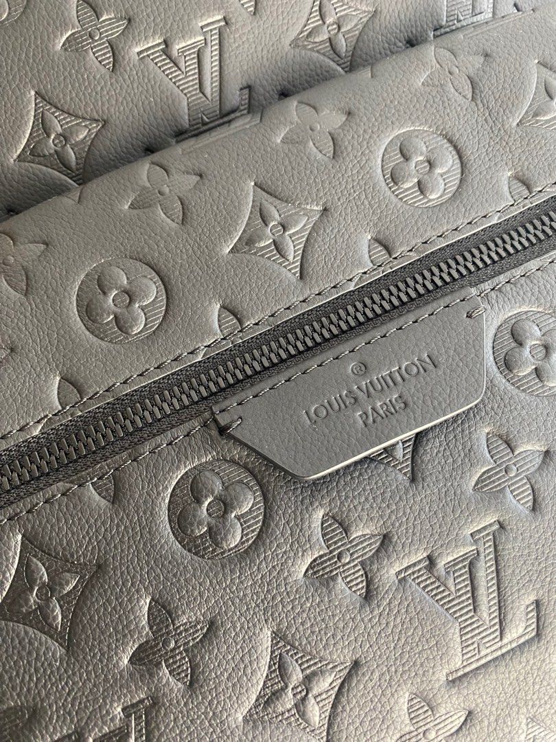 LOUIS VUITTON monogram embossed discovery backpack JAPAN source authentic leather FREE shipping (Category: Luxury Bags & Wallets) located in Cavite. Submitted by import_savers (Listing ID 1321409992, Image 2). Description: Made in France JAPAN source Authentic leather Calfskin, black hardware, double zip closure, front zipped pocket, 2 open side pockets, inside trio flat pockets With dustbag 29cm L x 20cm W x 38cm H FREE shipping.
