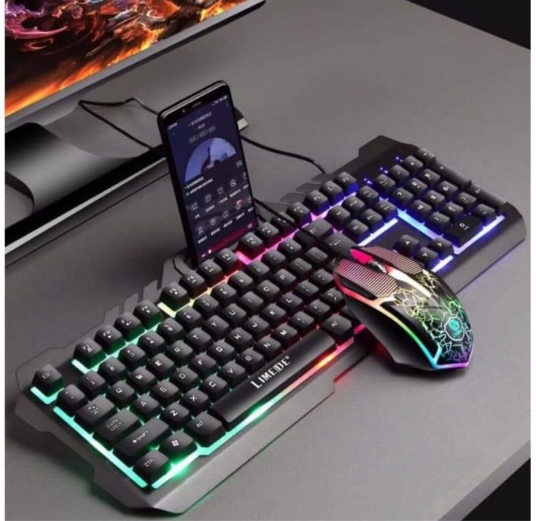 Mouse and Keyboard Set with Cellphone Stand and Light (Category: Computer Keyboard) located in Makati City. Submitted by meticoolous (Listing ID 1321461788, Image 2). Description: Metal Storm T21 Backlit Wired Gaming Keyboard and Mouse Set with Cellphone Holder Type: Game Set Connection with computer: Mouse wired, keyboard wired Keyboard interface: USB Mouse interface: USB Working method: Photoelectric Suitable for: home, games, office, notebook 