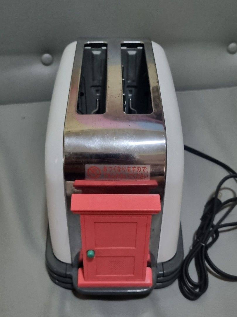 Sanyo SK ART 2 Original Doraemon toaster (Category: Ovens & Toasters) located in Silang. Submitted by samflores2k4t7 (Listing ID 1321339640, Image 2). Description: For sale Sanyo SK ART 2 Original Doraemon toaster 110 volts Made by Sanyo Japan Good working condition May konti rust s ibabaw.