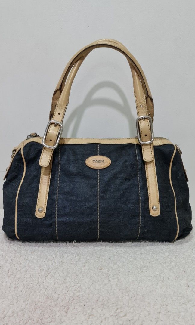 Tod's shoulder bag, leather and denim (Category: Luxury Bags & Wallets) located in Quezon City. Submitted by agreatbuy2018 (Listing ID 1321353671, Image 1). Description: AUTHENTIC TOD'S SHOULDER BAG, LEATHER AND DENIM MATERIAL. BAG REPAINTED WITH LEATHER PAINT, IN GREAT CONDITION. NO TEARS OR CRACKS, VERY CLEAN INTERIOR. MADE IN ITALY, 100% ORIGINAL, NICE IN ACTUAL, LIGHTWEIGHT ITEM IN QUEZON CITY BUYER PAYS FOR SHIPPING GCASH P4500.