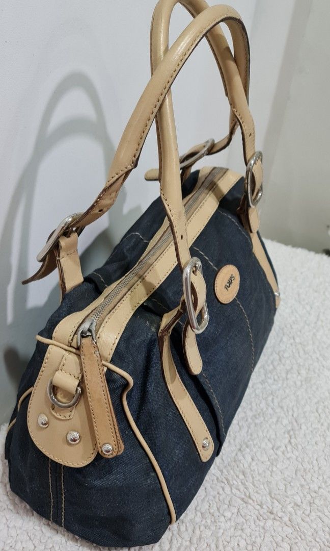 Tod's shoulder bag, leather and denim (Category: Luxury Bags & Wallets) located in Quezon City. Submitted by agreatbuy2018 (Listing ID 1321353671, Image 3). Description: AUTHENTIC TOD'S SHOULDER BAG, LEATHER AND DENIM MATERIAL. BAG REPAINTED WITH LEATHER PAINT, IN GREAT CONDITION. NO TEARS OR CRACKS, VERY CLEAN INTERIOR. MADE IN ITALY, 100% ORIGINAL, NICE IN ACTUAL, LIGHTWEIGHT ITEM IN QUEZON CITY BUYER PAYS FOR SHIPPING GCASH P4500.