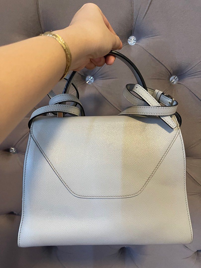 Valextra Iside (Category: Luxury Bags & Wallets) located in Roxas City. Submitted by lynngreyartillero (Listing ID 1321408832, Image 3). Description: Valextra Iside Small light Gray actual color Sign of used mejo malambot leather sa sides and tarnish ang sa lock sa loob at labas. Faded 🤍🤍🤍 Pero overall maganda sya no major flaws makinis pa ang leather 🤍🤍🤍 Pm free sf 🤍🤍🤍 pm lng mga madam 🤍🤍🤍 Godbless Us All 🤗🤗🤗.