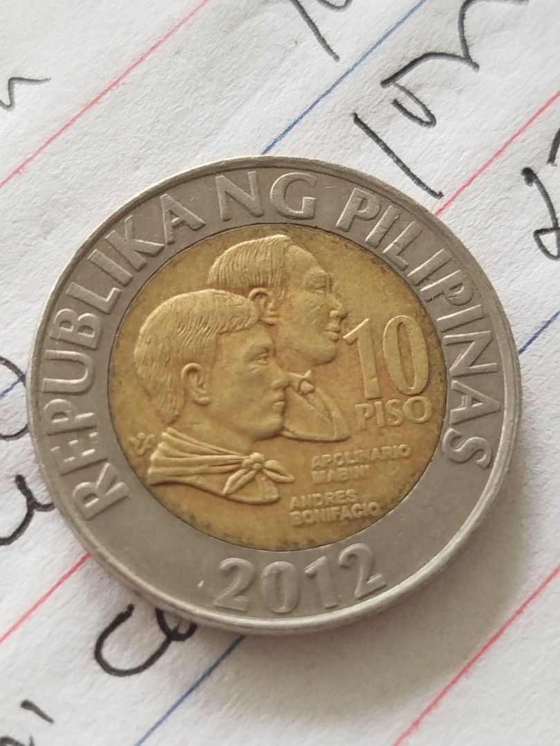 2012 10p BSP coin doubled die error harap at likod (Category: Currency) located in Subic. Submitted by regiedaniel01 (Listing ID 1321503339, Image 1). Description: add sf.
