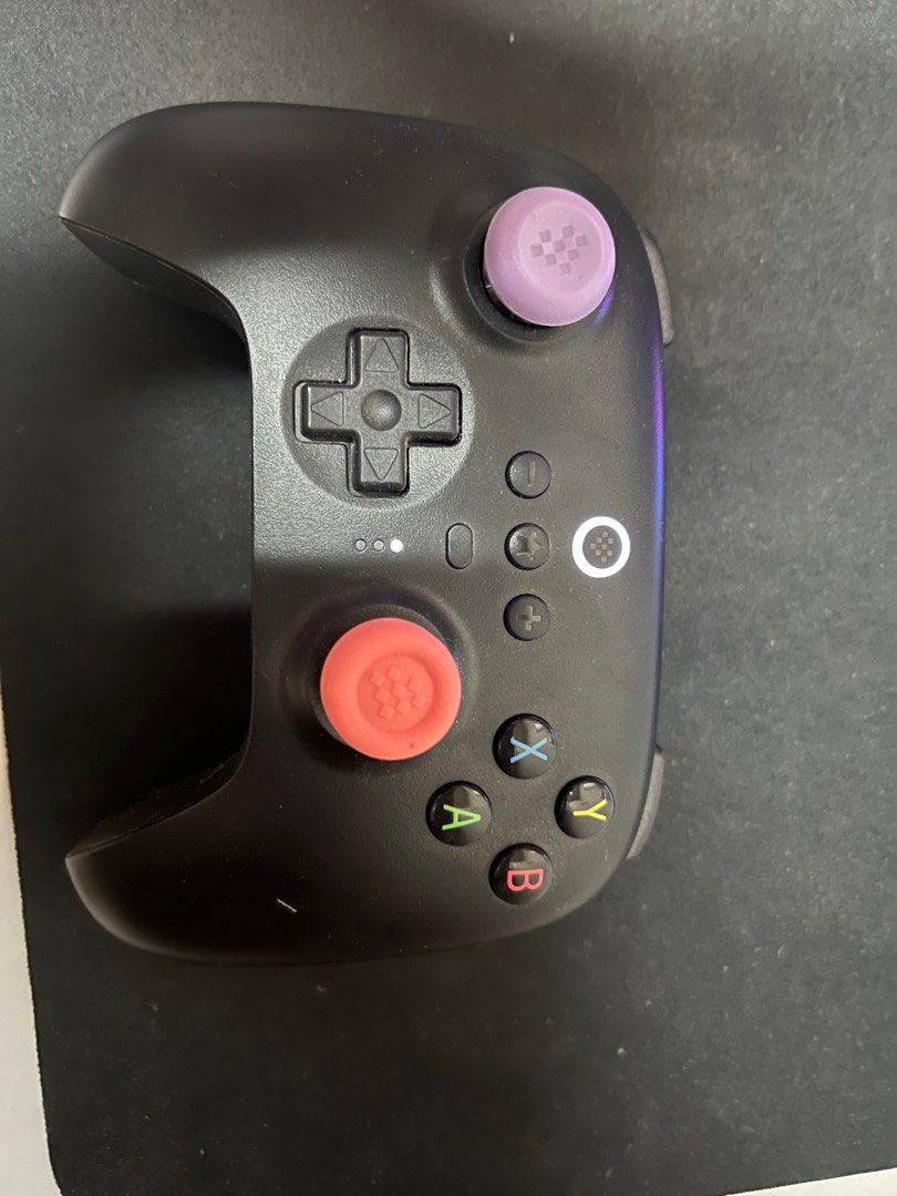 8bitdo ultimate controller (Category: Controllers) located in Kuala Lumpur. Submitted by nicholasdice (Listing ID 1321581753, Image 2). Description: - Compatible with iPhone, iPad, macOS and Apple TV now. (Officially Supported) - Compatible with Apple, PC, Android, Steam Deck & Raspberry Pi. - Multifunctional Charging Dock - Stable connection and controller will be automatically switching ON/OFF while it is undocked/docked. - Ultimate Software on