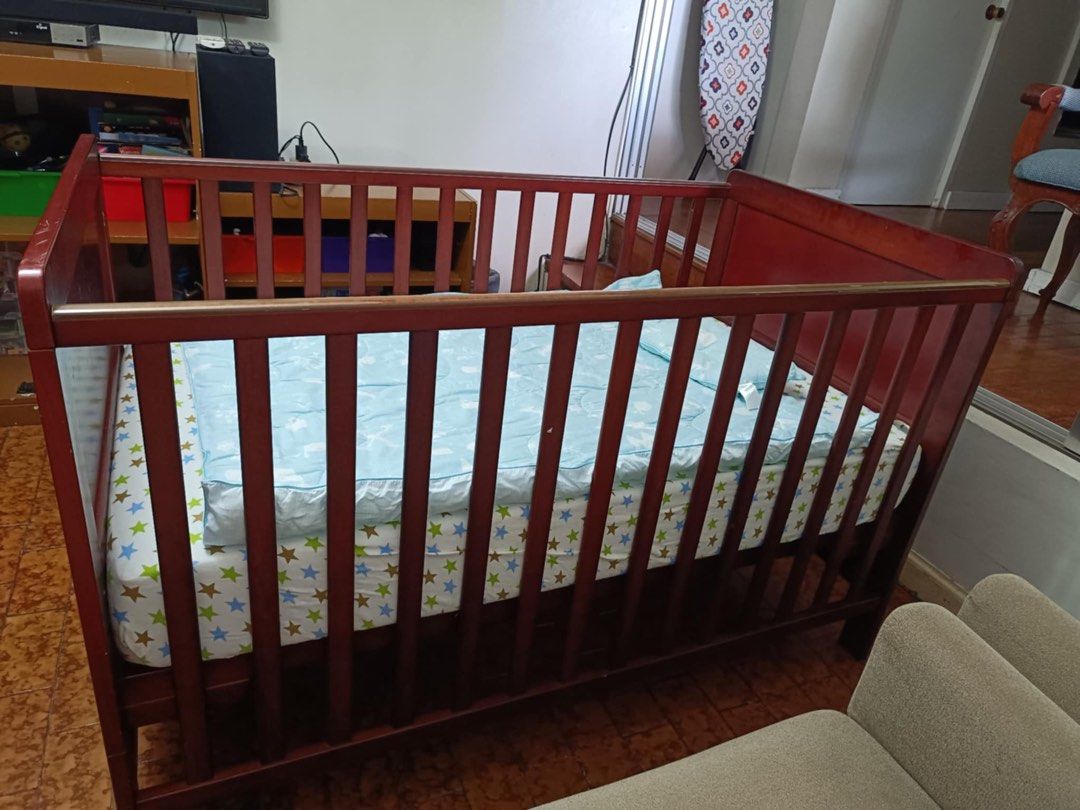 Cuddlebug Wooden Crib (Category: Cots & Cribs) located in Pasig City. Submitted by jacq0301 (Listing ID 1321553256, Image 3). Description: Well used wooden Baby Crib Comes with a lot freebies - mattress, mattress covers, comforters, wet pads With minor scratches Used less than 6 months Can be converted into a toddler bed Adjustable height .