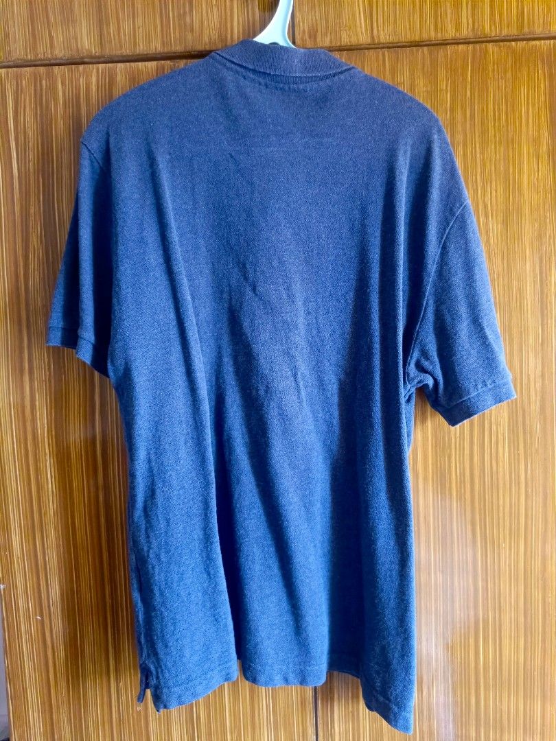 Lacoste Polo Shirt Slim Fit (Category: Tshirts & Polo Shirts ) located in Taguig. Submitted by omnieves (Listing ID 1321537749, Image 2). Description: Authentic Lacoste Polo Shirt Dark Blue color XL size 6 slim fit (W: 22.5" L: 29") Around 3x used only 9.5/10 condition RFS: decluttering Shipping Fee (shouldered by buyer).