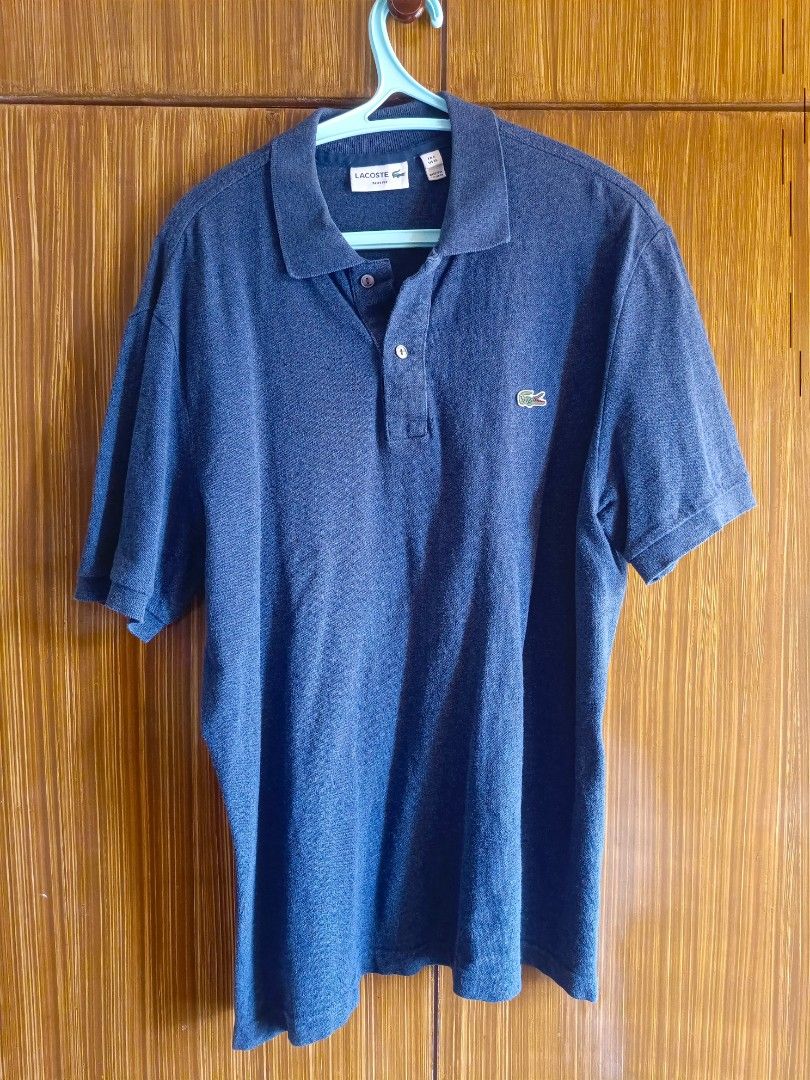 Lacoste Polo Shirt Slim Fit (Category: Tshirts & Polo Shirts ) located in Taguig. Submitted by omnieves (Listing ID 1321537749, Image 1). Description: Authentic Lacoste Polo Shirt Dark Blue color XL size 6 slim fit (W: 22.5" L: 29") Around 3x used only 9.5/10 condition RFS: decluttering Shipping Fee (shouldered by buyer).