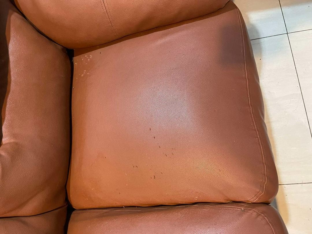 Leather Sofa Set - Mahogany (Category: Sofas) located in Quezon City. Submitted by bettygorosperemaxc (Listing ID 1321550603, Image 3). Description: - A 3-seater & 2-seater leather sofa set with custom fabric cover - Few cat scratches - Well-maintained.