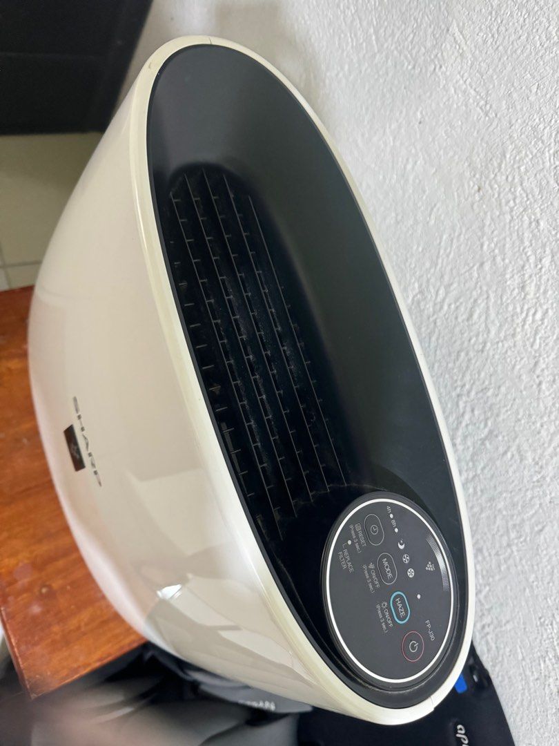 Sharp Air Purifier (Category: Other Home Furniture) located in Taguig. Submitted by ceespi (Listing ID 1321493035, Image 2). Description: Air Purifier RFS: Seldom Use of unit No Issue With minor scratches .