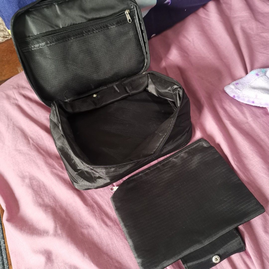 Black Travel bag / organizer / pouch / packing cube (Category: Purses & Pouches) located in Manila. Submitted by mochibibi (Listing ID 1321665644, Image 3). Description: Travel bag / organizer / pouch / packing cube With snap on mini pouch Rfs: decluttering.