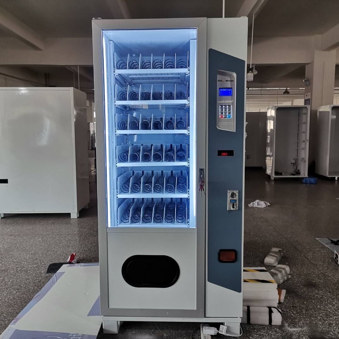 Cigarette vending machine(MINI) (Category: Office & Business Technology) located in Caloocan City. Submitted by 09051674995 (Listing ID 1321664628, Image 1). Description: Machines Name : Cigarette vending machine(MINI) HS code : 8476.21 or 8476.81 Specification : 1913 mm (high) * 890 mm (length) * 820 mm (wide) Weight : 150kg Screen : with a 3.5 inches LCD Screen. Capacity: 6 shelf,6 items for each shelf ,4-12 pieces for each type can saleable St